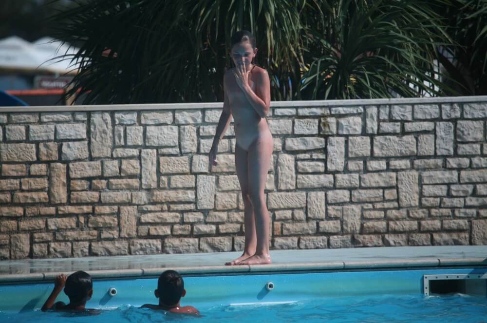 Naturist Pool-Side Singles photos - Nudists strive for inner harmony and peace of mind