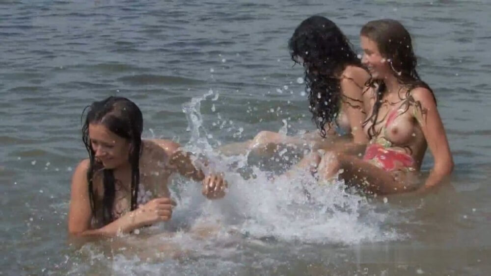 Body Art At Nudist Beach - Naturists are open to the world and the environment
