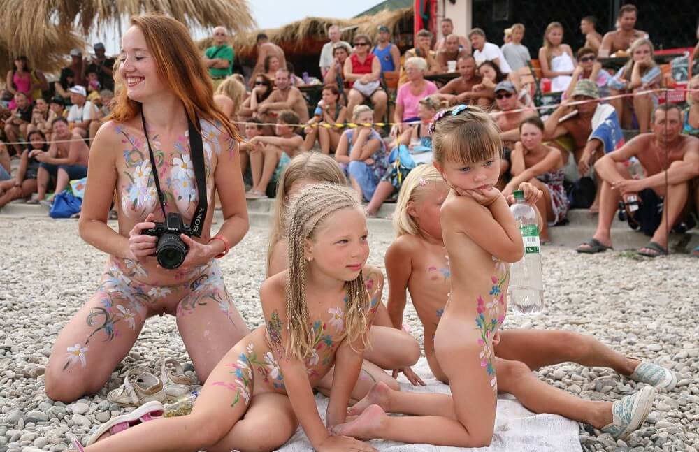 Warm Sand Relaxation photos - Interaction with Nature Through Naturism
