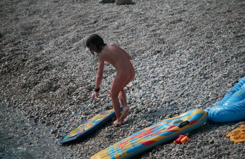 Naturist Surf Board Glides pics - The Naked Human Body