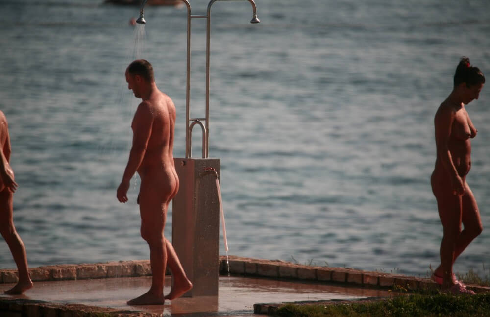 Naturist Shower at Dusk pics - Values trust and friendliness among naked people