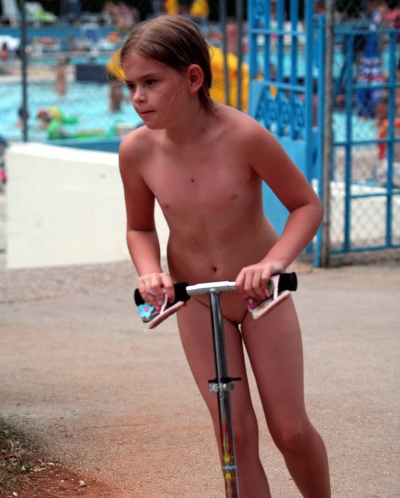 Pool-Side Naturist Scooter pics - Spontaneous Nudism Thrives