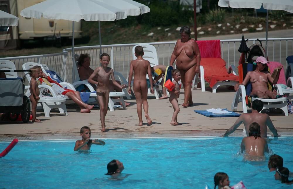 Naturist Afternoon Pool Games pics - Getting rid of swimsuits
