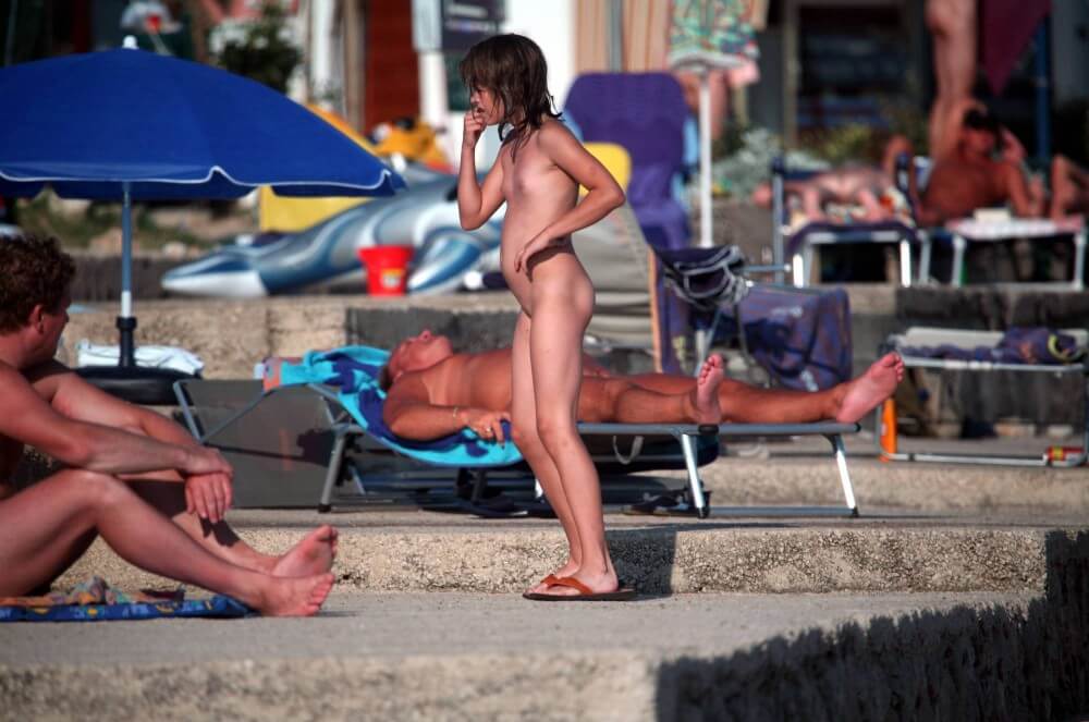 Girl Walk to Nudist Shower pics - A love for the sun and fresh air are important values for naturists