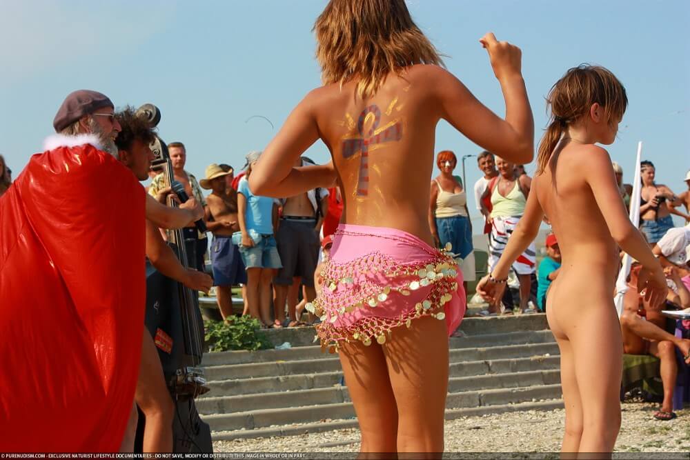 Colorful Carnival Dancing photos - The practice of nudism promotes freedom from fears and insecurities